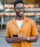man smiling and looking around