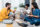people sitting on ground eating food